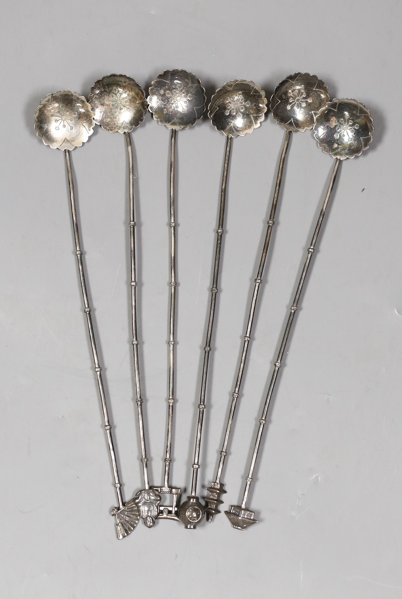 A set of six Japanese sterling iced teaspoons, 19.5cm, with differing terminals, 48 grams.